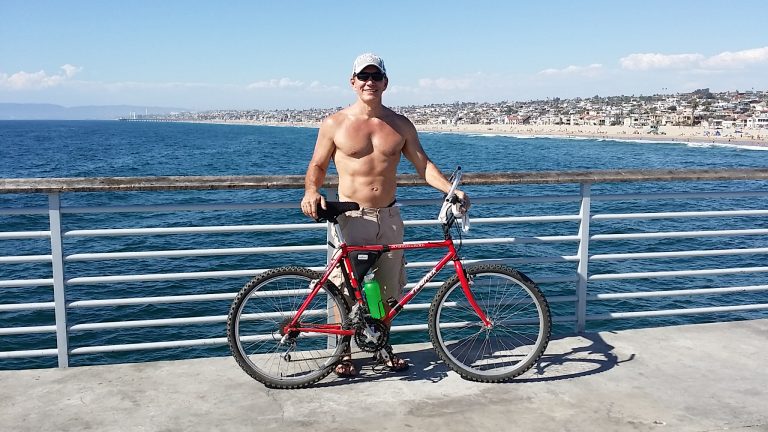 Richard Uzelac with Bike on Hermosa Beach Pier
